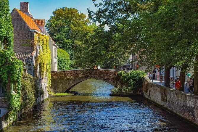 Private taxi Transfer from Bruges to Amsterdam - On the road in a Mercedes: Wi‑Fi, A/C, bottled water